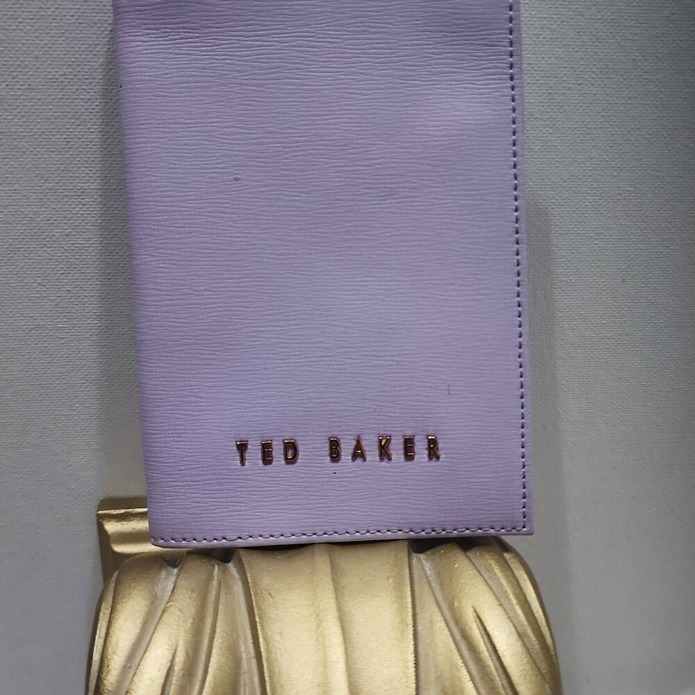 Ted Baker leather passport holder features rose gold foil branding.